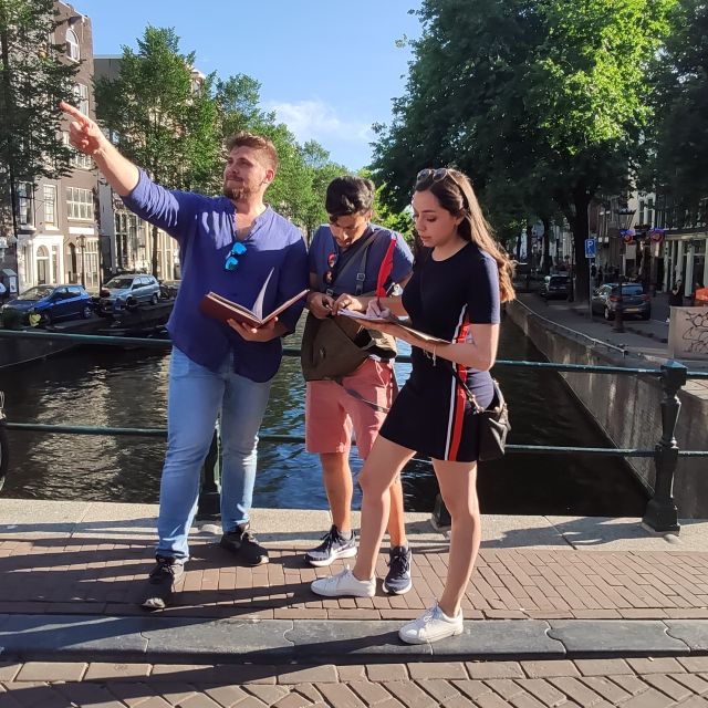 Amsterdam: Treasure Hunt Walking Tour "A Secret Sender" - Torensluis Bridge: a clue break with city views