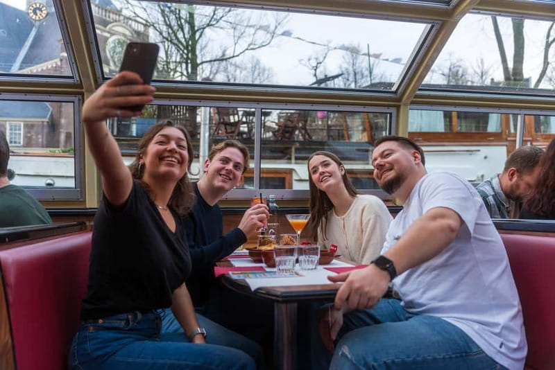 Amsterdam: Unlimited Cocktails Cruise on the Canals - The UNESCO Canal District at night: the route highlights that matter