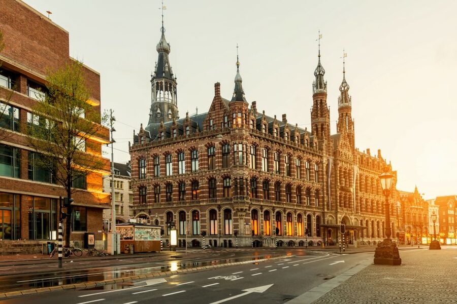 Amsterdam Walking Tour and Canal Cruise - The 60-minute glass-roof canal cruise: Amsterdam from water level