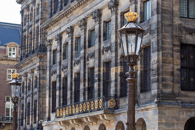 Amsterdam Walking Tour: Urban Legends & History with local guide - Stop 3: Spui, cafes, and one story hiding in plain daylight