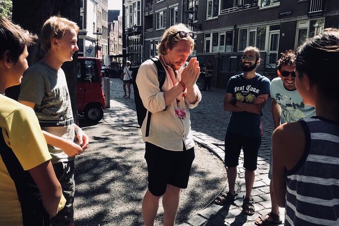 Amsterdam Walking Tour with a local comedian as guide - Stop 2: Amsterdam’s symbols at Dam Square & Damstraat