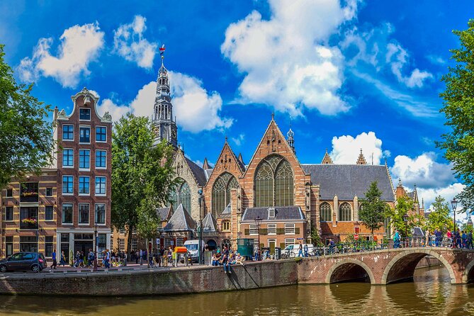 Amsterdam Walking Tour with Audioguide on Your Smartphone - The Weeping Tower Stop That Plays With Your Expectations