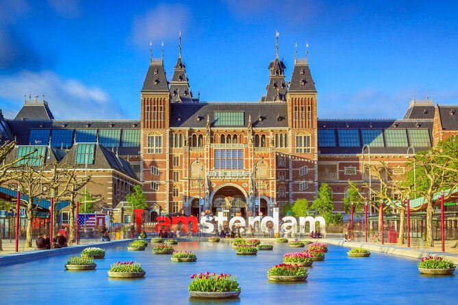 Amsterdam Walking Tour with Audioguide on Your Smartphone - Getting Started at Amsterdam Centraal: Old Harbor to Train Station