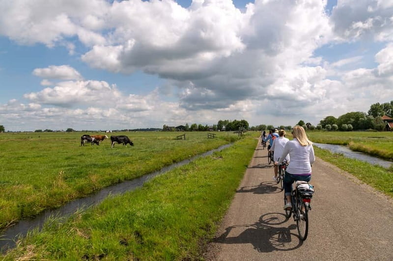 Amsterdam: Windmill, Cheese, and Countryside E-Bike Tour - Getting Out of Amsterdam by Ferry and E-Bike