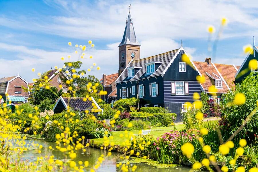 Amsterdam: Zaanse Schans, Marken, Volendam, & Edam Day Tour - Zaanse Schans windmills: the best start for first-time Dutch culture