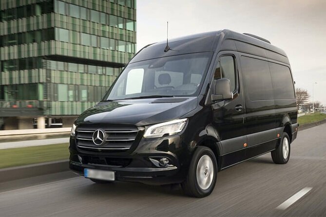 Arrival Private Transfer Amsterdam Airport to Amsterdam City Center by Minibus - Driver help in English/Dutch, plus real city value