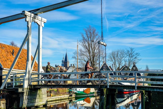 Bike rental Volendam - Explore the Countryside of Amsterdam - Extending to Marken: The 10 km Dike, Canal Bridges, and a Bike-on-Boat Return