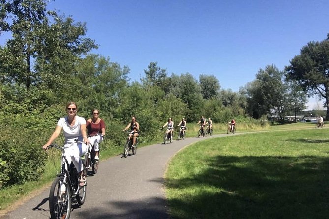 Cheese, Canals & Windmill Countryside E-Bike Tour Amsterdam - Cheese tasting and clogs: the fun break you’ll remember
