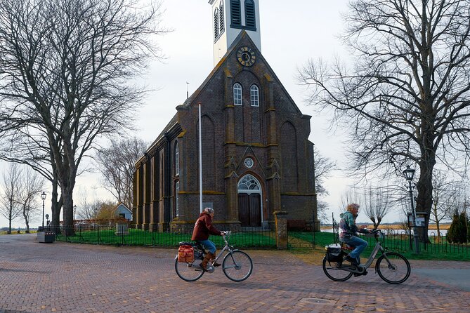 Cheese, Canals & Windmill Countryside E-Bike Tour Amsterdam - Dutch weather rules: ride rain or shine, so pack smart