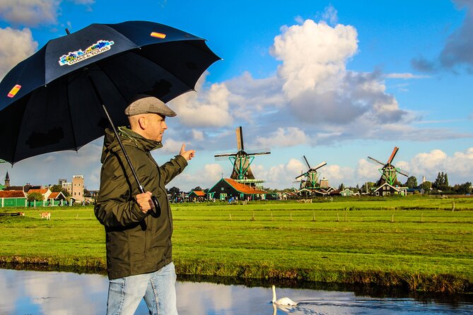 Day Trip to Zaanse Schans, Edam, Volendam and Marken from Amsterdam - Volendam Harbor Time: Fishing Village Atmosphere and Food Choices