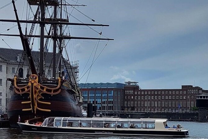 Discover Amsterdam: Luxury Canal Cruise with a Local Skipper - Stepping onto a covered, heated boat (and how to get the best view)