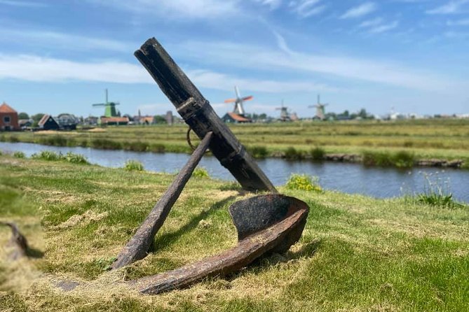 Escape Amsterdam: E-Bike to Zaanse Schans Windmills & Zaandam - Oosterdokskade meet-up and the ferry jump that changes your mood