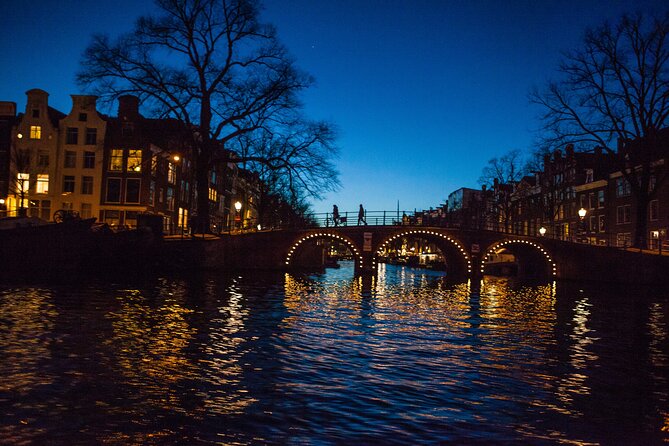 Evening Canal Cruise in Amsterdam with Wine & Cheese Option - UNESCO canal views: Canal District, Westerkerk, and Centraal from the water
