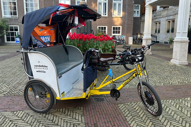 Explore Amsterdam in 75 Minutes – Pedicab Rickshaw City tour - Muntplein pickup and finding your driver fast