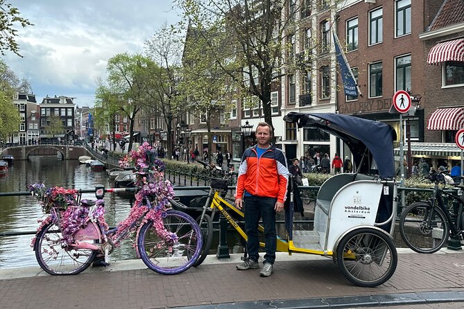 Explore Amsterdam in 75 Minutes – Pedicab Rickshaw City tour - Price and logistics: is $215.69 per group actually good value?