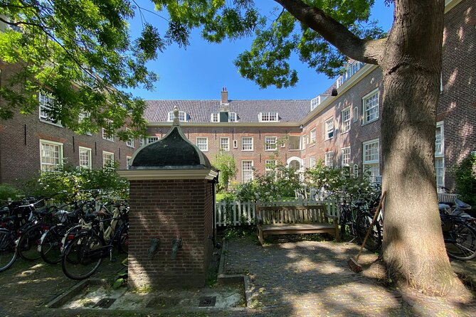 Explore hidden streets with friends - Private Tour - A private Amsterdam walk that trades crowds for courtyards