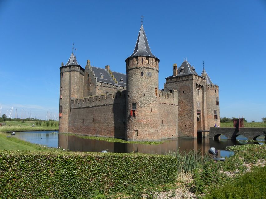 From Amsterdam: Amsterdam Castle Muiderslot Private Tour - Getting There in Comfort: Hotel Pickup, Water, and Wi‑Fi