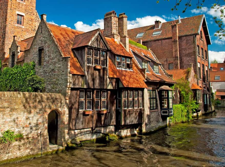 From Amsterdam: Bruges Day Tour in Spanish or English - Price and Value: What $60 Includes (and What Costs Extra)