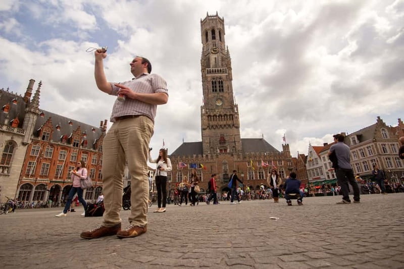 From Amsterdam: Bruges Day Tour in Spanish or English - Top Sights on Foot: Béguinage, Holy Blood Basilica, Belfry, and Market Square