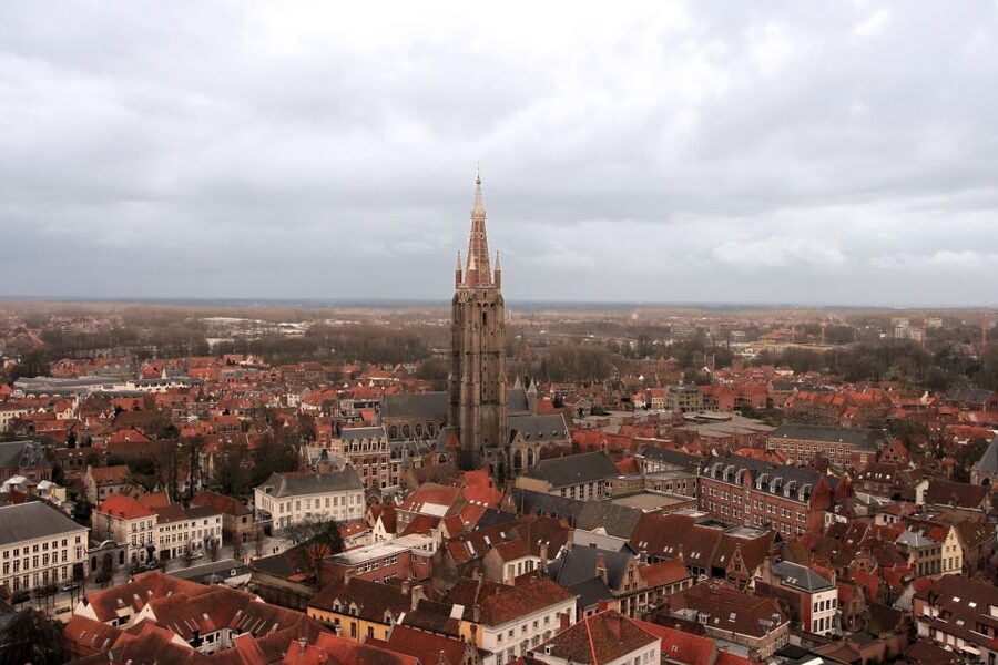 From Amsterdam: Bruges Day Trip in English with Boat Option - Belgium beer, chocolate, and lace: the shopping stops with a purpose
