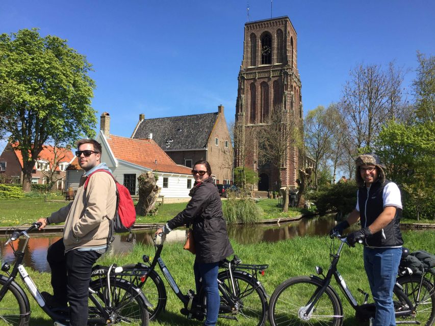 From Amsterdam: Countryside Bike Tour - Leaving Amsterdam: IJ-lake Ferry, Dams, and Getting Your Bearings