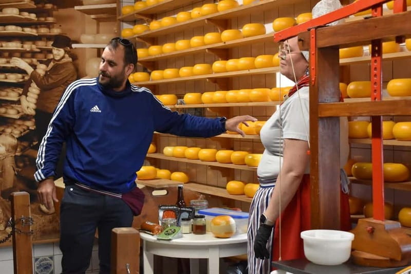 From Amsterdam: Keukenhof Tulips, Windmills & Volendam - A real farm stop for clog-making and Gouda/Edam cheese