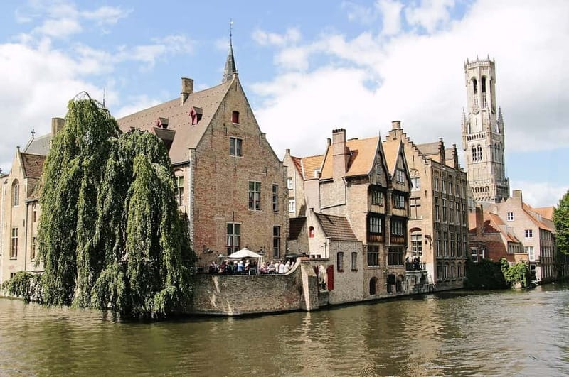 From Amsterdam: Private Sightseeing Tour to Bruges - Arriving in Bruges: cobblestones, canals, and romantic bridges