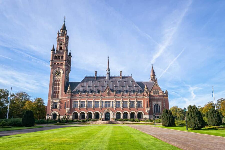 From Amsterdam: Rotterdam, Delft & The Hague Guided Day Tour - Finding the IJ Hall Meeting Point and Settling Into the Day
