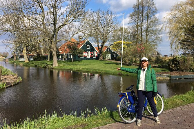 Full-Day Private Guided Countryside Tour from Amsterdam by Bike - Monnickendam fishing village: harbour stroll and smoked eel lunch