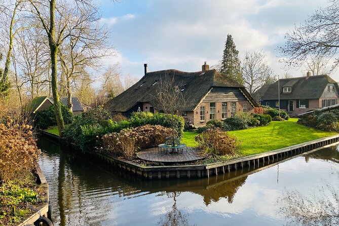 Giethoorn and Zaanse Schans Day Tour Small Group Incl. Boat Ride - Clogs at the wooden shoe workshop: hands-on watching, plus photo moments