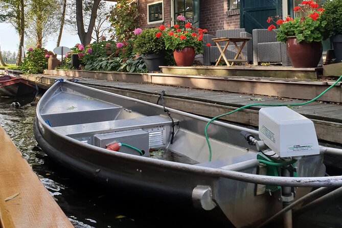 Giethoorn Day Tour from Amsterdam with Small Boat Ride - Walking Giethoorn: Thatched Roofs, Narrow Paths, and Quiet Corners
