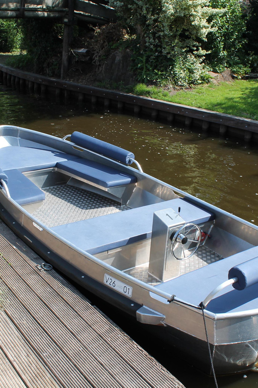 Giethoorn: Self-Drive Boat Rental for up to 8 People - The boat you’ll drive: steering wheel, cushions, and a very practical layout