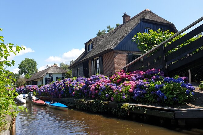 Giethoorn, Zaandam & Zaanse Schans Day Tour w/ Small Boat Ride - Morning Pickup in Amsterdam: Getting to the Countryside Without Stress