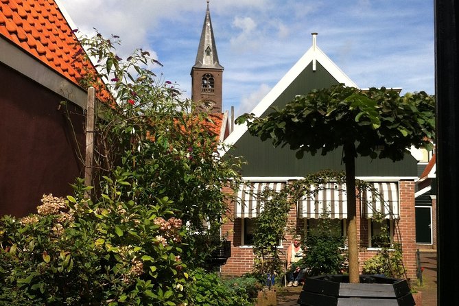 Half-Day Edam and Volendam Private Walking Tour from Amsterdam - Edam City Center: canals, swans, and wooden houses with a guide’s stories