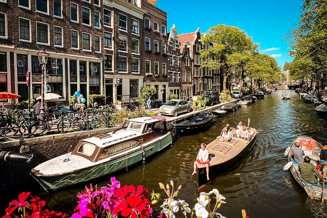 Humans of Amsterdam: Cultural Walking Tour incl. meeting 2 locals - Paradox Coffeeshop and Ludo: Cannabis Culture Through a Real Owner’s Story