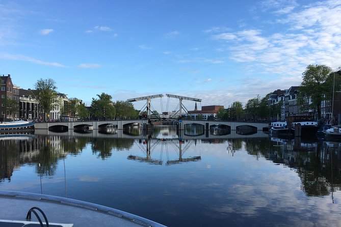 Morning Canal Cruise Amsterdam in Small-Group - Stop by stop: how the 90-minute canal glide plays out