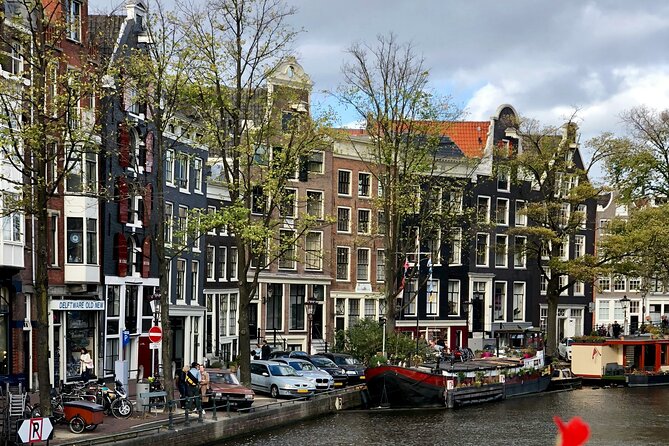 Personalized Hidden Gems of Amsterdam Private Tour with a Local - St. Nicholas Basilica, Old Buildings, and Amsterdam’s “Dancing” Design