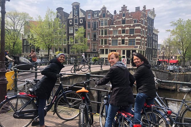 Private Amsterdam Bike Tour with a local guide (also for families) - Dam Square and Damstraat: the city’s starting point energy