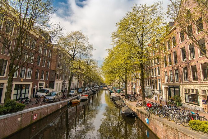 Private Amsterdam City Highlights Bike Tour (PRIVATE GUIDE) - Amsterdam in 2 Hours: Why Bikes Beat Foot Power