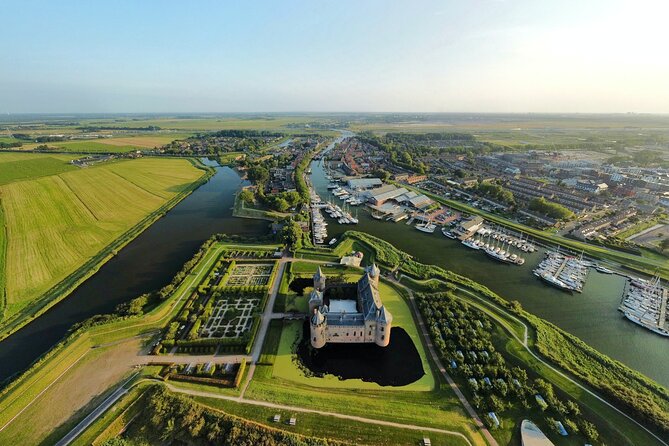 Private bike tour: Hidden gems around Amsterdam and surroundings - Stop 2: Provincialeweg farm time with goats, cows, sheep, and peacocks