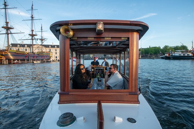 Private Boat Tour Amsterdam - 90 Min incl. welcome drink on historic saloon boat - Your 90-Minute Canal Cruise: What Happens During the Ride