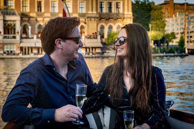 Private Boat Tour Amsterdam - 90 Min incl. welcome drink on historic saloon boat - How the Guide Turns Views Into Dutch History and Culture
