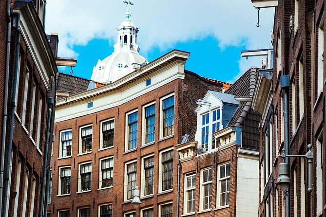 Private City Kickstart Tour: Amsterdam - St. Nicholas Church to Chinatown: architecture and multicultural streets