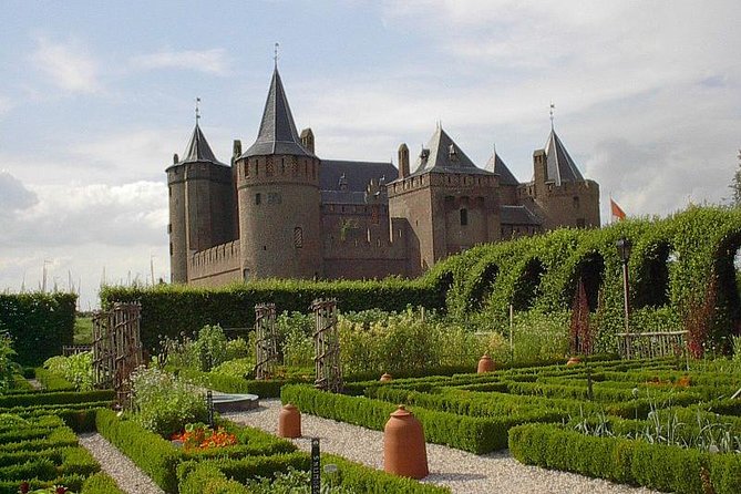 Private day trip to the Dutch castles from Amsterdam - Kasteel de Haar: Ornate Grandeur and the Story of Restoration
