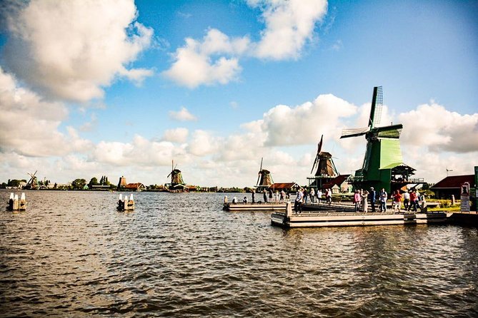 Private Daytrip Giethoorn and Windmills of Zaanse Schans from Amsterdam - Back in Amsterdam at night: let your guide steer you