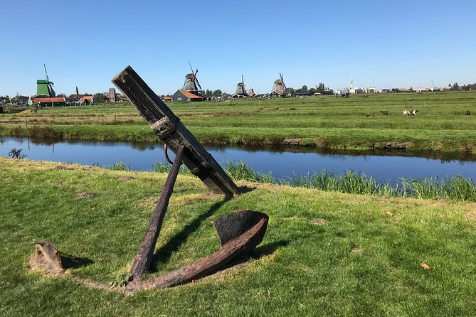 Private Excursion to Zaanse Schans, Edam, Volendam and Marken - Volendam harbor: fish lunch vibes and the dike story