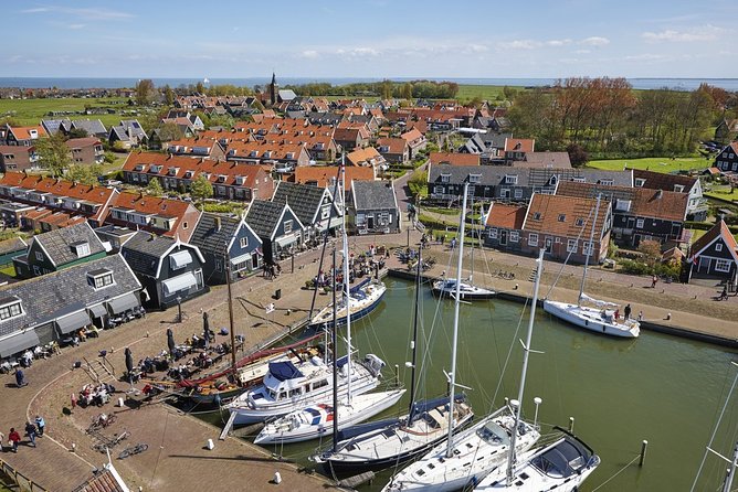 Private Excursion to Zaanse Schans, Edam, Volendam and Marken - Marken: colorful houses and how flooding shaped everyday life
