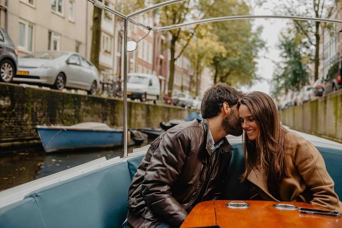 Private Romantic Canal Cruise Amsterdam with Bubbly and Snacks - Comfort, weather, and the one thing to plan for