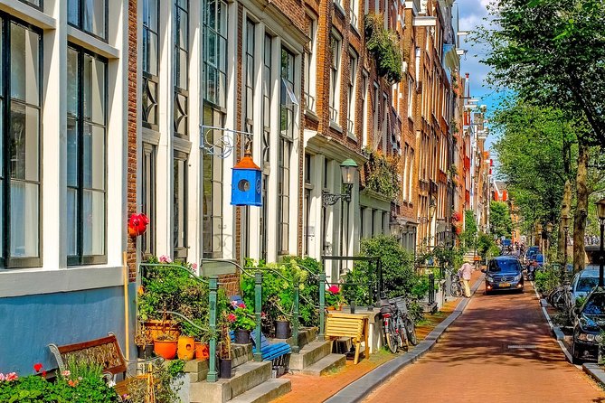 Private Tour: Amsterdam City Walking Tour and Canal Cruise - The canal cruise: see Golden Age canals from the water