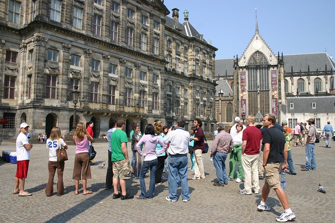 Private Tour: Amsterdam City Walking Tour and Canal Cruise - Dam Square orientation: the tram gets you to the good stuff